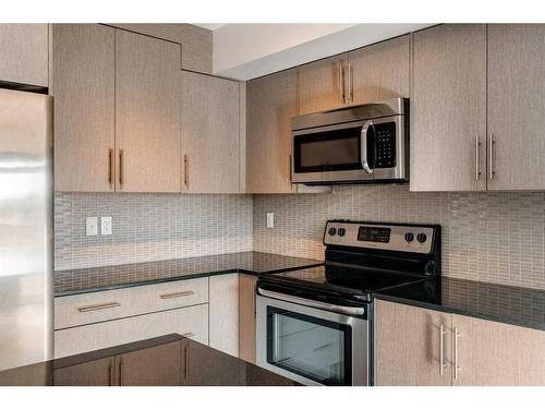 87 West Coach Manor Sw, Calgary, AB - Indoor Photo Showing Kitchen