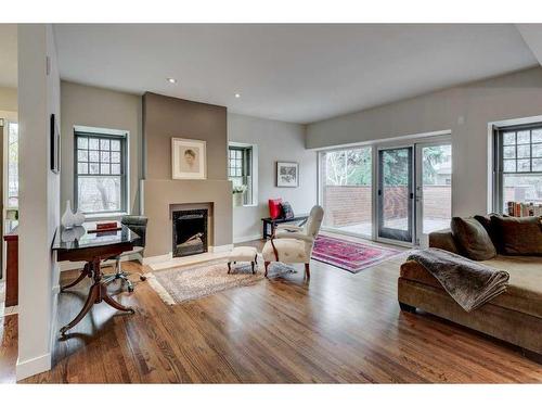 3012 7 Street Sw, Calgary, AB - Indoor Photo Showing Living Room With Fireplace