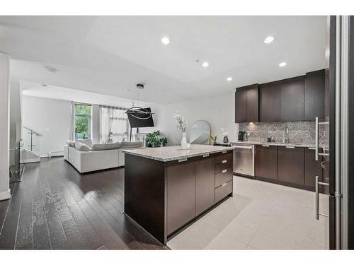 132-99 Spruce Place Sw, Calgary, AB - Indoor Photo Showing Kitchen With Upgraded Kitchen