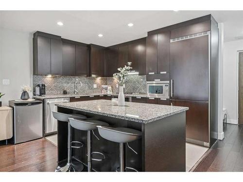 132-99 Spruce Place Sw, Calgary, AB - Indoor Photo Showing Kitchen With Stainless Steel Kitchen With Upgraded Kitchen