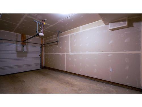 144-2117 81 Street Sw, Calgary, AB - Indoor Photo Showing Garage