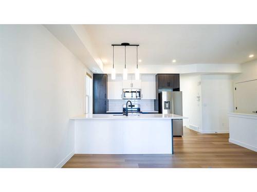 144-2117 81 Street Sw, Calgary, AB - Indoor Photo Showing Kitchen