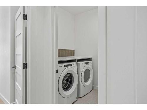 251B Three Sisters Drive, Canmore, AB - Indoor Photo Showing Laundry Room