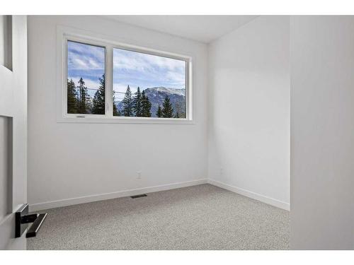 251B Three Sisters Drive, Canmore, AB - Indoor Photo Showing Other Room