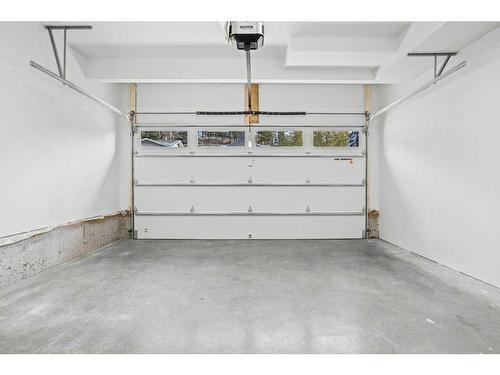 251B Three Sisters Drive, Canmore, AB - Indoor Photo Showing Garage