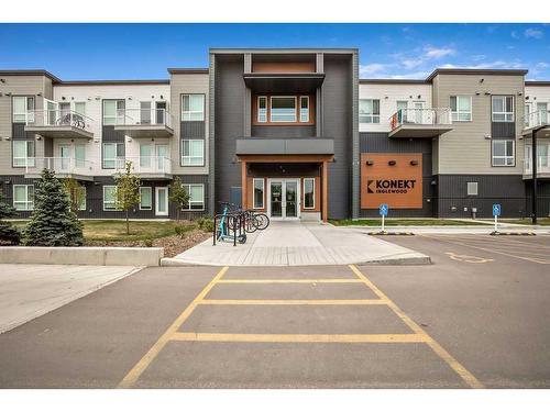 107-1605 17 Street Se, Calgary, AB - Outdoor With Facade