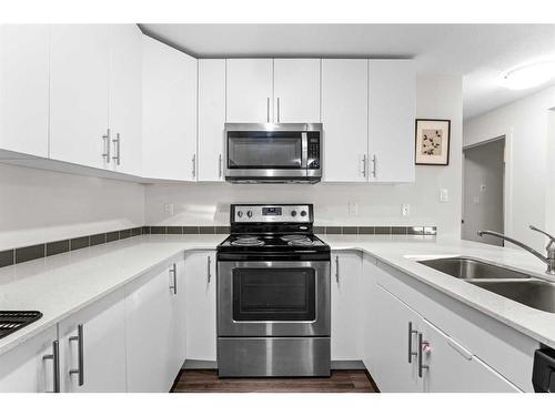 4118-181 Skyview Ranch Manor Ne, Calgary, AB - Indoor Photo Showing Kitchen With Stainless Steel Kitchen With Double Sink