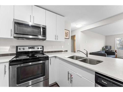 4118-181 Skyview Ranch Manor Ne, Calgary, AB - Indoor Photo Showing Kitchen With Stainless Steel Kitchen With Double Sink