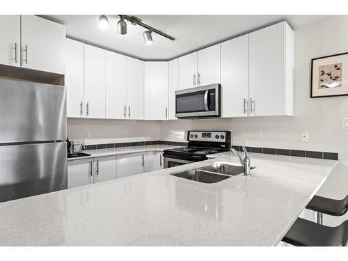 4118-181 Skyview Ranch Manor Ne, Calgary, AB - Indoor Photo Showing Kitchen With Stainless Steel Kitchen With Double Sink With Upgraded Kitchen