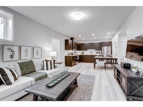 164 Setonstone Manor Se, Calgary, AB - Indoor Photo Showing Living Room