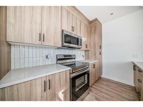 45 Shale Avenue, Cochrane, AB - Indoor Photo Showing Kitchen