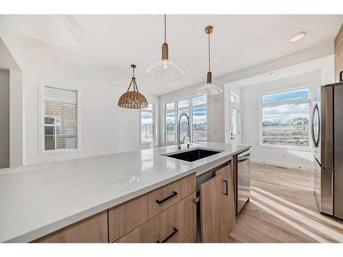 45 Shale Avenue, Cochrane, AB - Indoor Photo Showing Kitchen With Upgraded Kitchen