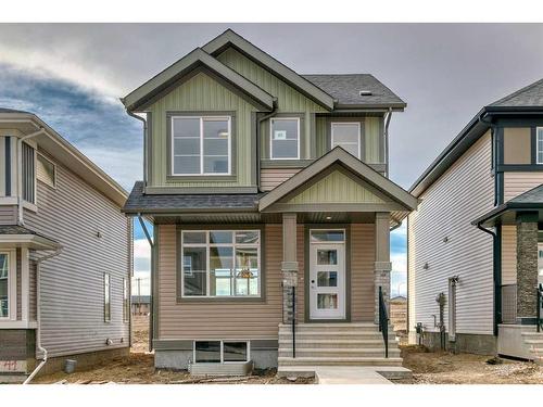 45 Shale Avenue, Cochrane, AB - Outdoor With Facade