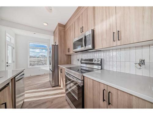 45 Shale Avenue, Cochrane, AB - Indoor Photo Showing Kitchen