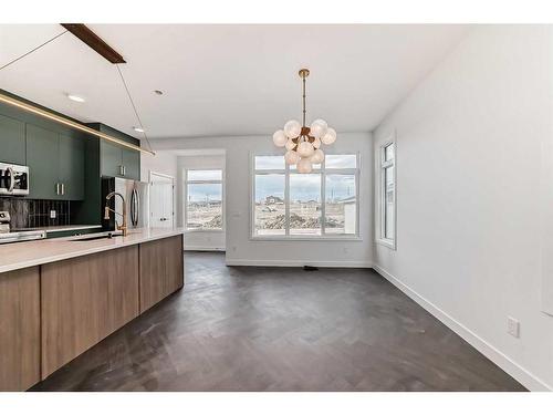 57 Shale Avenue, Cochrane, AB - Indoor Photo Showing Kitchen