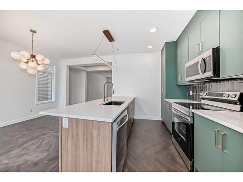 57 Shale Avenue, Cochrane, AB - Indoor Photo Showing Kitchen