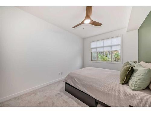 110-16 Auburn Bay Link Se, Calgary, AB - Indoor Photo Showing Bedroom