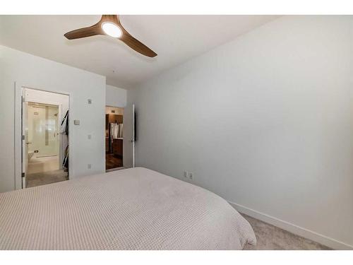 110-16 Auburn Bay Link Se, Calgary, AB - Indoor Photo Showing Bedroom