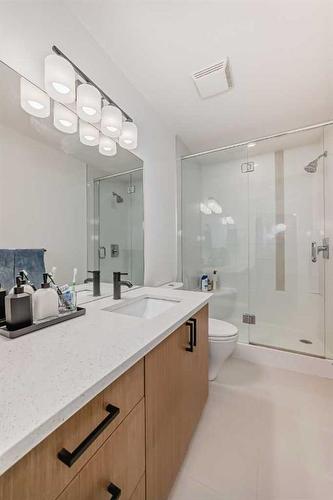 110-16 Auburn Bay Link Se, Calgary, AB - Indoor Photo Showing Bathroom