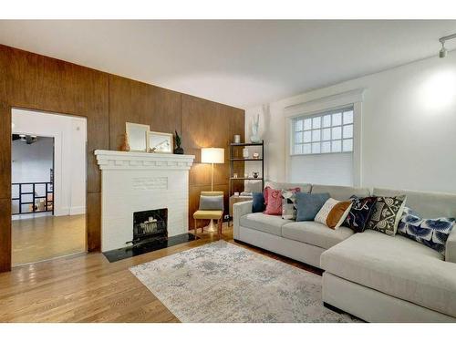 915 18 Avenue Sw, Calgary, AB - Indoor Photo Showing Living Room With Fireplace