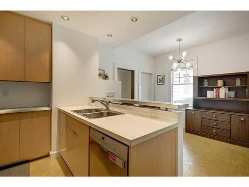 915 18 Avenue Sw, Calgary, AB - Indoor Photo Showing Kitchen With Double Sink