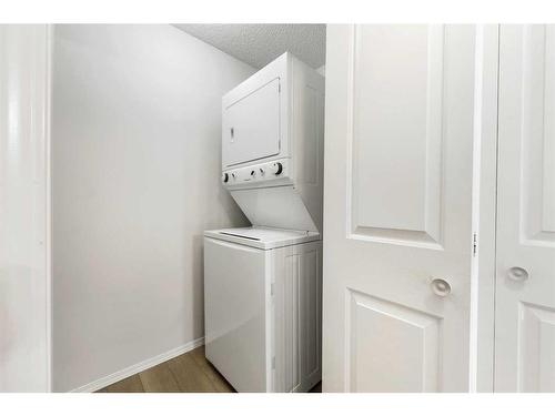 115-3000 Somervale Court Sw, Calgary, AB - Indoor Photo Showing Laundry Room