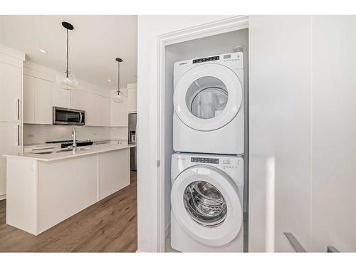 4211-111 Wolf Creek Drive Se, Calgary, AB - Indoor Photo Showing Laundry Room