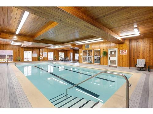 449-8535 Bonaventure Drive Se, Calgary, AB - Indoor Photo Showing Other Room With In Ground Pool