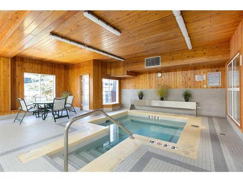 449-8535 Bonaventure Drive Se, Calgary, AB - Indoor Photo Showing Other Room With In Ground Pool