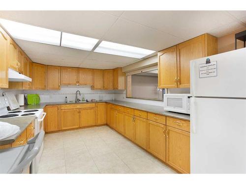 449-8535 Bonaventure Drive Se, Calgary, AB - Indoor Photo Showing Kitchen With Double Sink