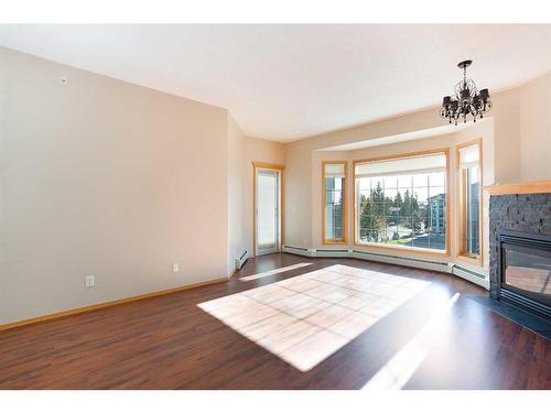 449-8535 Bonaventure Drive Se, Calgary, AB - Indoor With Fireplace