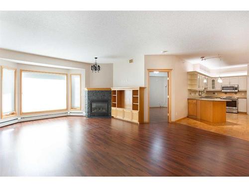 449-8535 Bonaventure Drive Se, Calgary, AB - Indoor With Fireplace