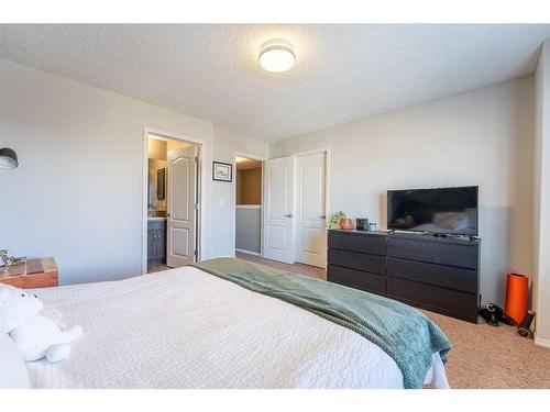 150 Cranford Common Se, Calgary, AB - Indoor Photo Showing Bedroom