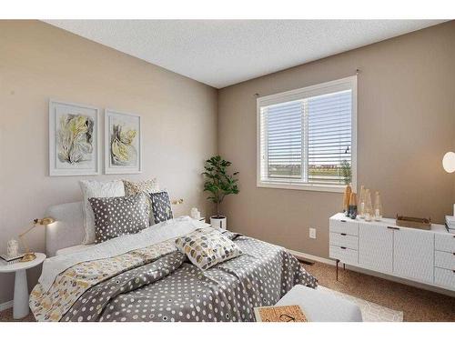 150 Cranford Common Se, Calgary, AB - Indoor Photo Showing Bedroom