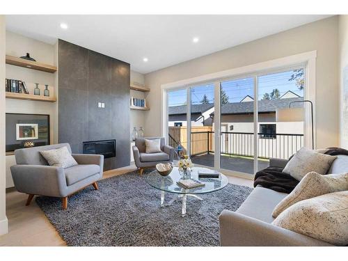 2418 35 Street Sw, Calgary, AB - Indoor Photo Showing Living Room With Fireplace