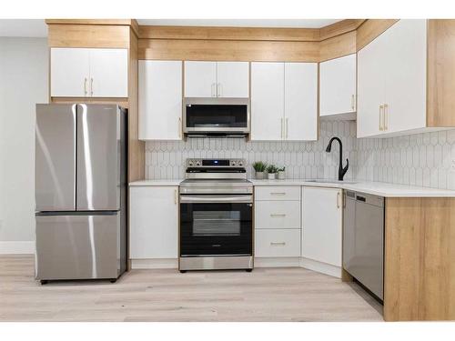 2418 35 Street Sw, Calgary, AB - Indoor Photo Showing Kitchen With Stainless Steel Kitchen