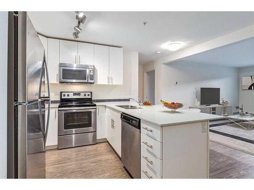 1412-181 Skyview Ranch Manor Ne, Calgary, AB - Indoor Photo Showing Kitchen With Double Sink