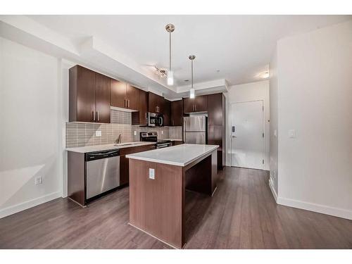 112-15233 1 Street Se, Calgary, AB - Indoor Photo Showing Kitchen