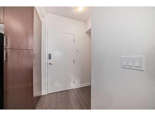 112-15233 1 Street Se, Calgary, AB - Indoor Photo Showing Other Room