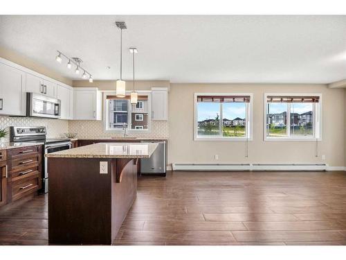 4301-450 Sage Valley Drive Nw, Calgary, AB - Indoor Photo Showing Kitchen With Stainless Steel Kitchen With Upgraded Kitchen