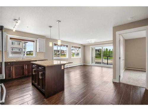 4301-450 Sage Valley Drive Nw, Calgary, AB - Indoor Photo Showing Kitchen With Upgraded Kitchen