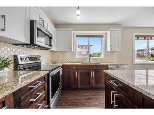 4301-450 Sage Valley Drive Nw, Calgary, AB - Indoor Photo Showing Kitchen With Stainless Steel Kitchen With Upgraded Kitchen