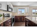 4301-450 Sage Valley Drive Nw, Calgary, AB  - Indoor Photo Showing Kitchen With Stainless Steel Kitchen With Upgraded Kitchen 