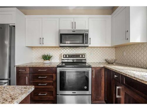 4301-450 Sage Valley Drive Nw, Calgary, AB - Indoor Photo Showing Kitchen With Stainless Steel Kitchen With Upgraded Kitchen