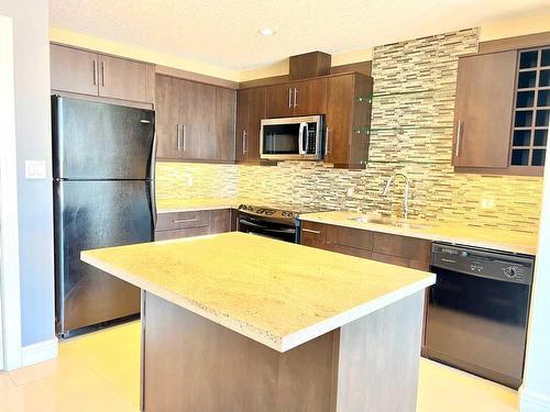 1701-55 Spruce Place Sw, Calgary, AB - Indoor Photo Showing Kitchen