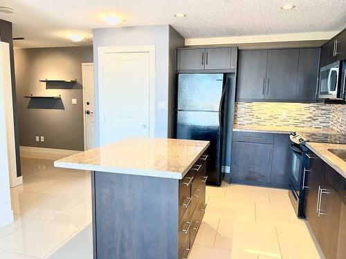 1701-55 Spruce Place Sw, Calgary, AB - Indoor Photo Showing Kitchen