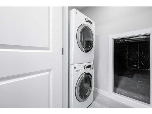 51 Carrington Crescent Nw, Calgary, AB - Indoor Photo Showing Laundry Room