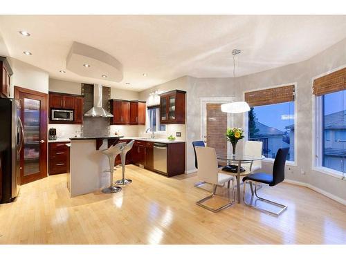 8 Hamptons Place Nw, Calgary, AB - Indoor Photo Showing Kitchen With Stainless Steel Kitchen With Upgraded Kitchen