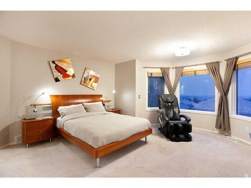 8 Hamptons Place Nw, Calgary, AB - Indoor Photo Showing Bedroom