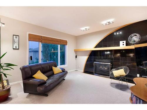 8 Hamptons Place Nw, Calgary, AB - Indoor With Fireplace